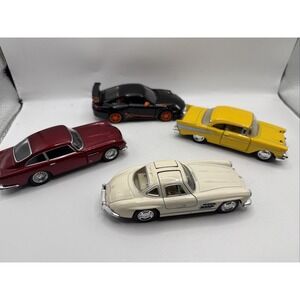 Lot 4 Kinsmart 54 Mercedes 300 SL, 63 Ashton Martin DB5 57 Chevy BelAir 10 Por.